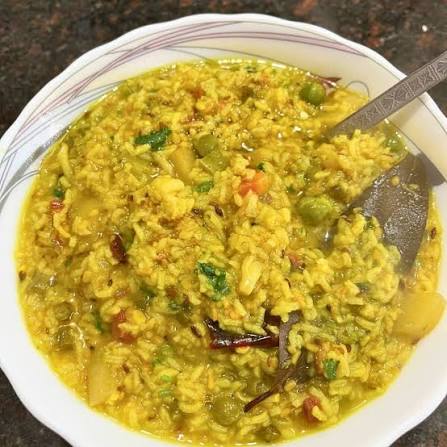 Jeera rice and moong dal khichdi with kadhi in Hubli